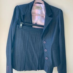 Gray pinstripe wool suit. Jacket and pleated skirt